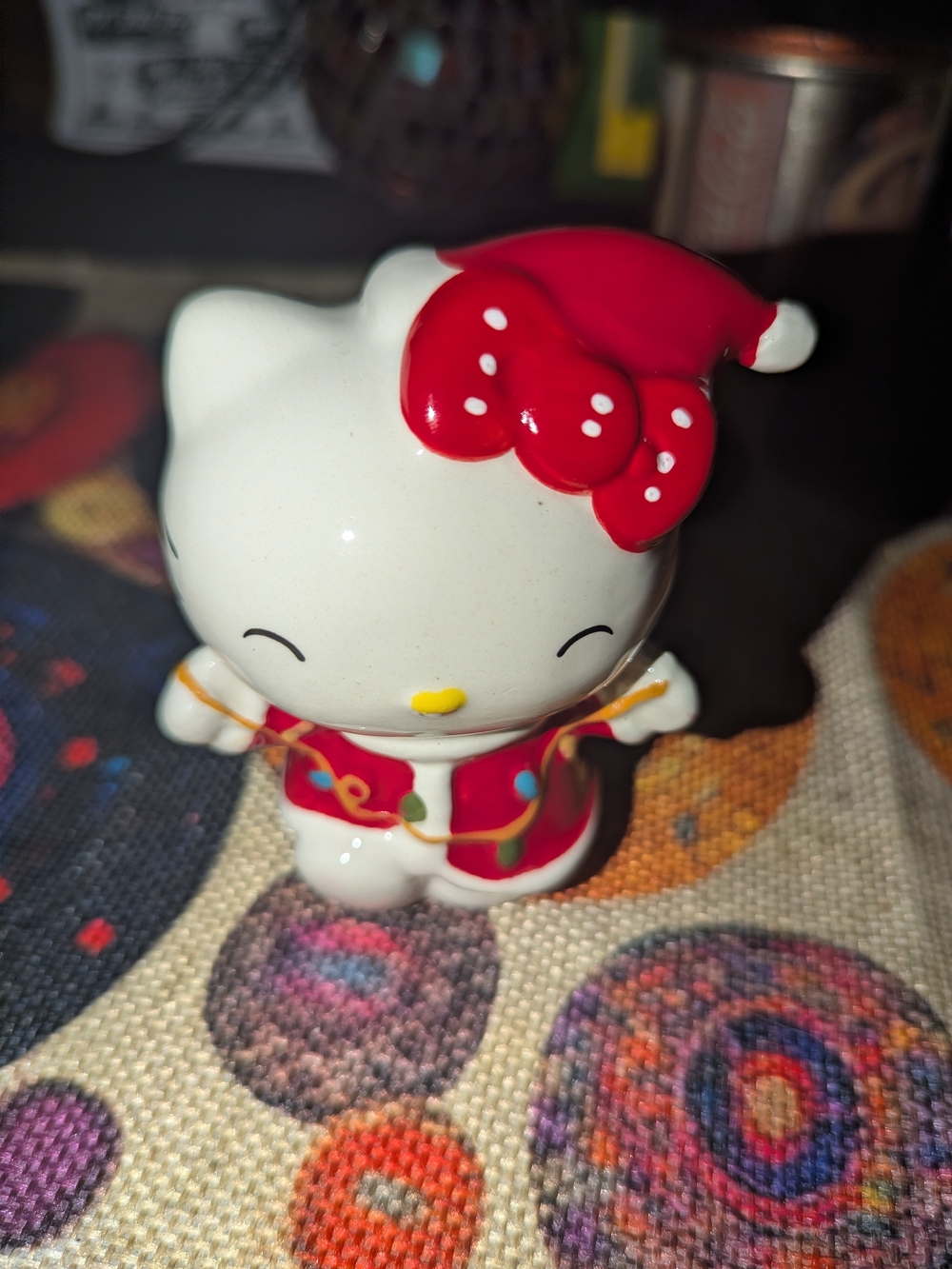 Hello Kitty Red and White Ceramic Holiday Figurine with Yellow Nose